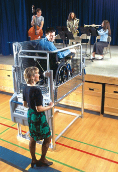 Wheelchair lifts for accessing school stages.